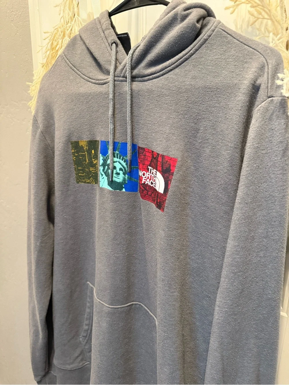 The North Face Men's Gray Pullover Hoodie with Graphic Logo